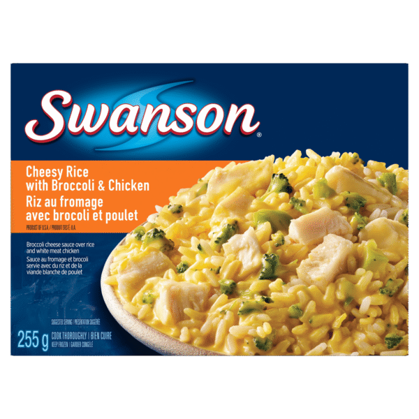 Swanson Cheesy Rice with Broccoli & Chicken Frozen Dinner. Broccoli Cheese Sauce Over Rice and White Meat Chicken. Swanson Cheesy Rice with Broccoli & Chicken. 255g